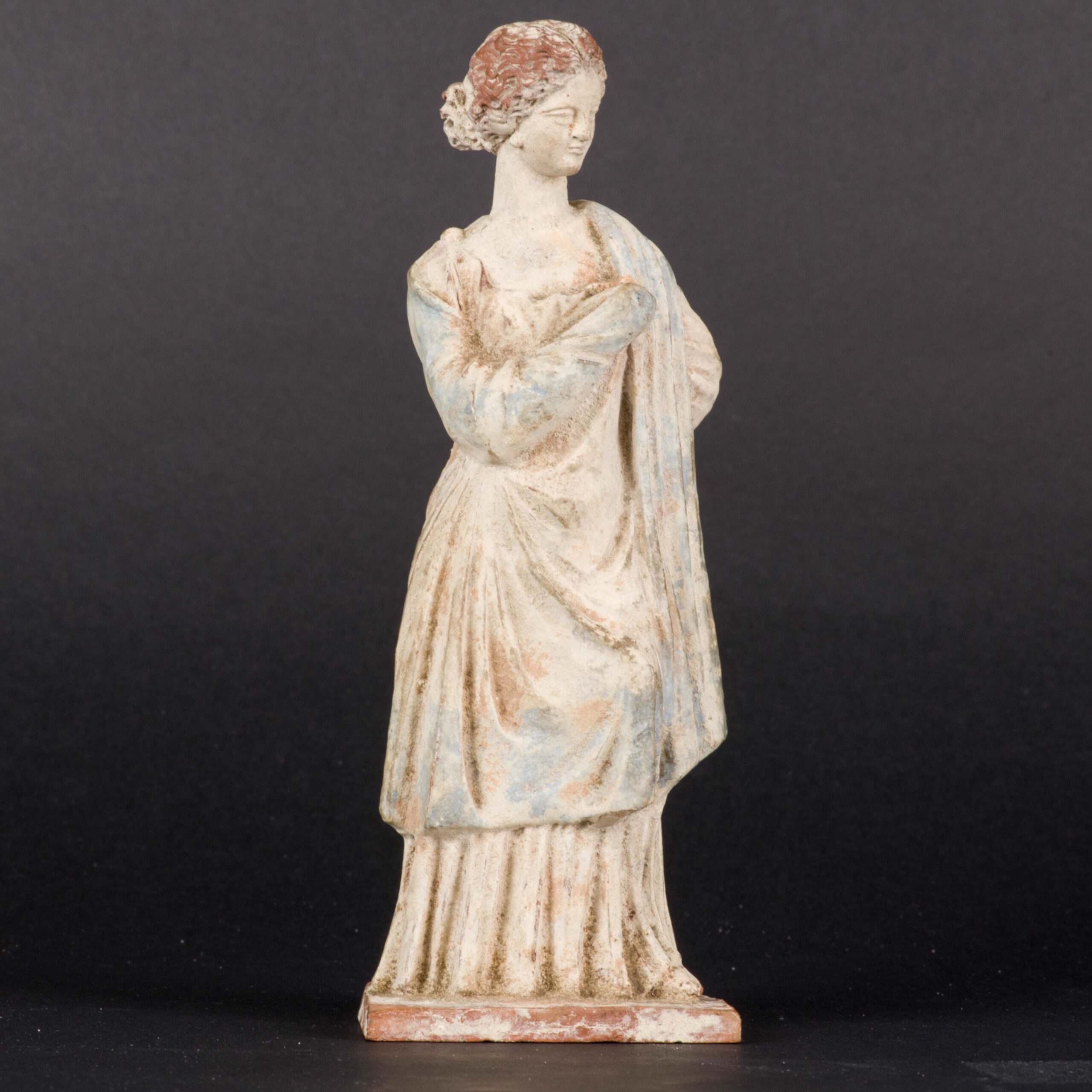 Female Tanagra Figurine